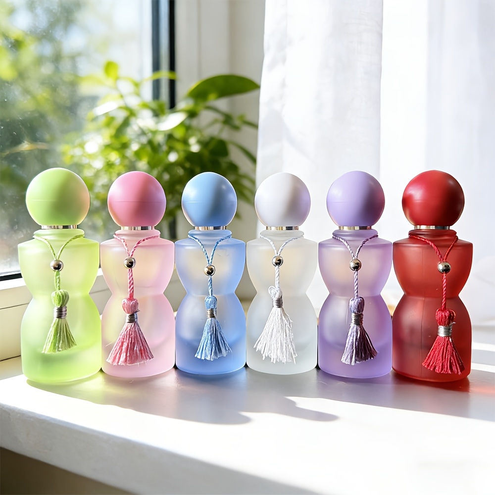 Perfume Imperium Fragrance World - ขวดน้ำหอมแก้วขนาด 30 มล. พร้อมฝาทรงกลมหลากสีและพู่ห้อย ภาชนะบรรจุเครื่องสำอางแก้วความจุขนาดใหญ่ เหมาะสำหรับใช้ในบ้าน
